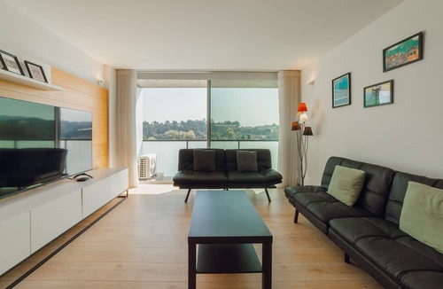 Vila Nova de Gaia Apartment | Amazing Riverview Apartment w Pool by Vacationy