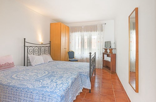 Porto Covo House | Room 'Quarto 7' in Porto Covo with a Fan