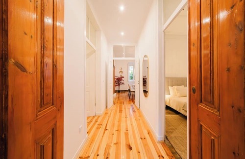 Alfama Apartment | Historic Lisbon retreat with large garden, heated jacuzzi, and views of São Vicente de Fora. Sleeps 14, with large living and dining spaces, private external annex, and just steps from Chiado, Avenida da Liberdade, and the riverfront.