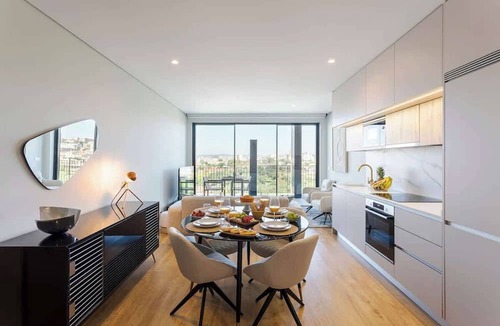 Santa Marinha Apartment | Premium Flat w/Balcony & Shared Pool by HostWise
