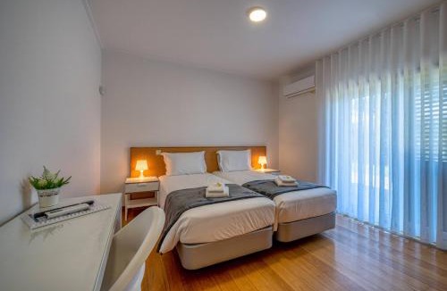 Arouca House | Central Suítes Arouca
