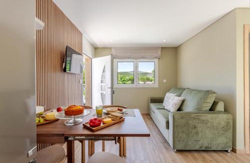 Castelo de Paiva Apartment | Boutique River Houses with Pool, Terrace and Garden by HostWise
