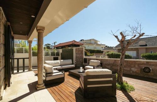 Vila Cha House | Beach Villa with Jacuzzi & Garage by HostWise