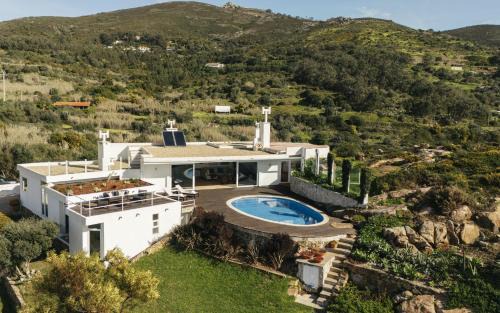 Monserrate Villa | Biscaia Blue Horizon by ClamaRetreats