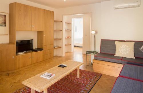 Santa Engracia Apartment | Stylish Home With Private Patio by LovelyStay