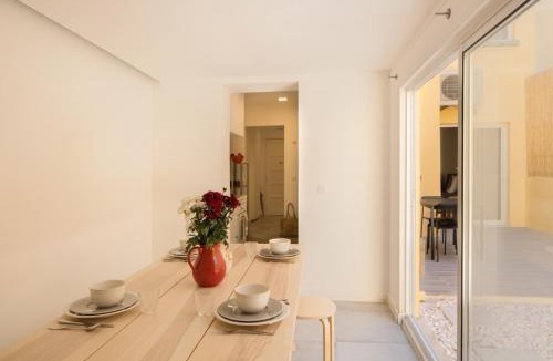 Santa Engracia Apartment | Stylish Home With Private Patio by LovelyStay