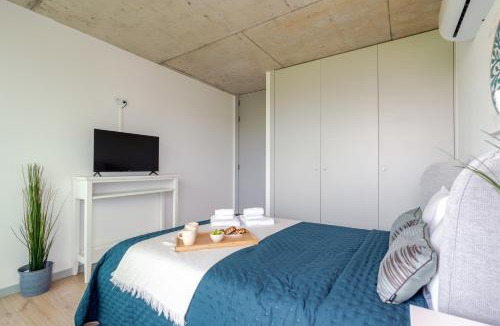Vila Nova de Gaia Apartment | HostWise - Modern Flat w/Balcony, Garage & Pool