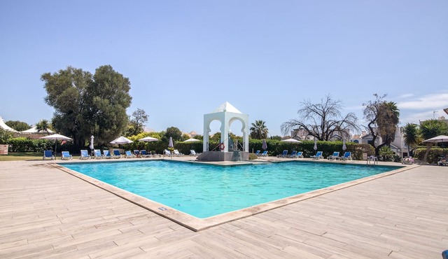 Spacious Villa with Private Garden and Shared Pool in Cabanas